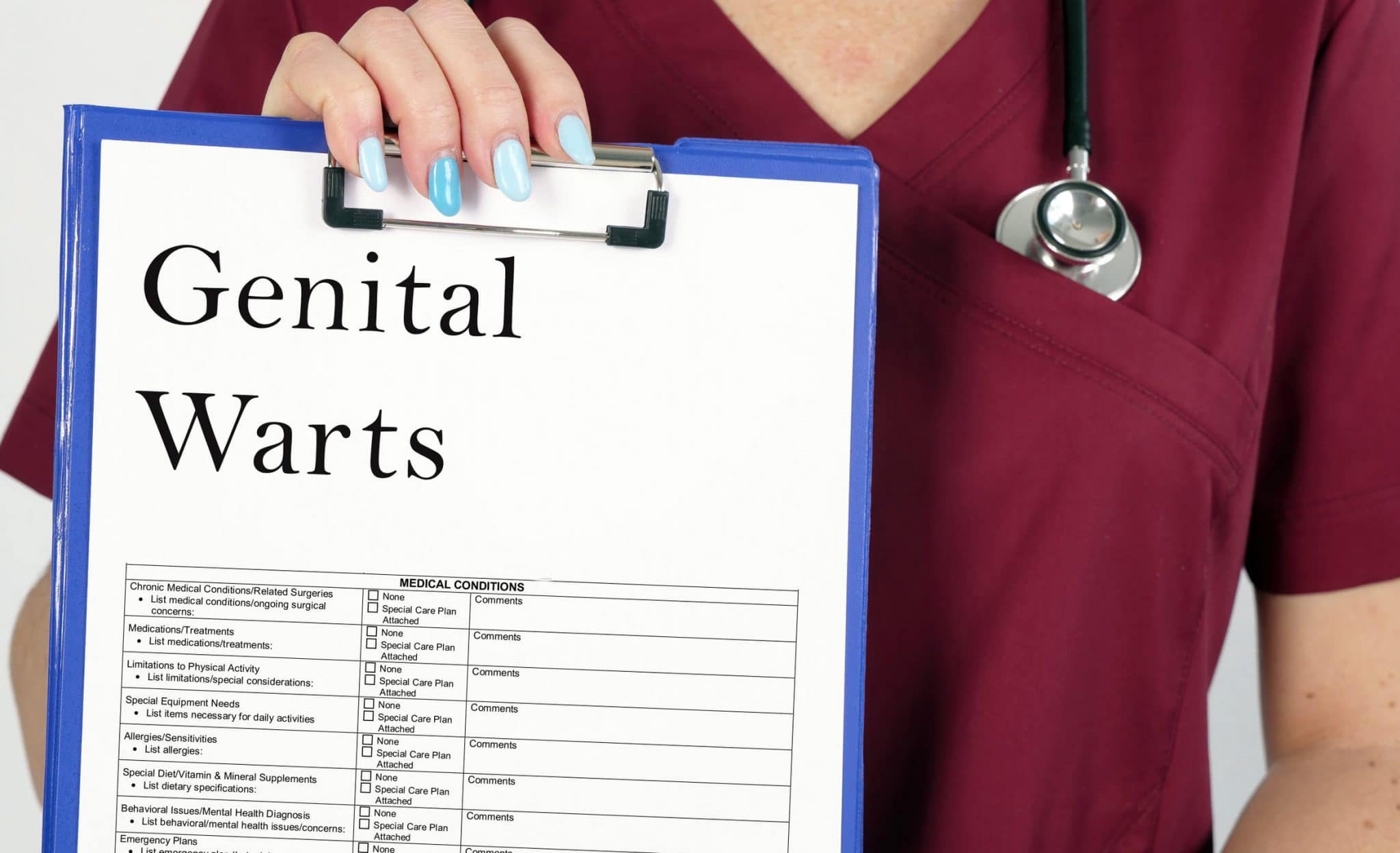 Meidcal Pratitioner holding a clipboard with a piece of paper saying Genital Warts