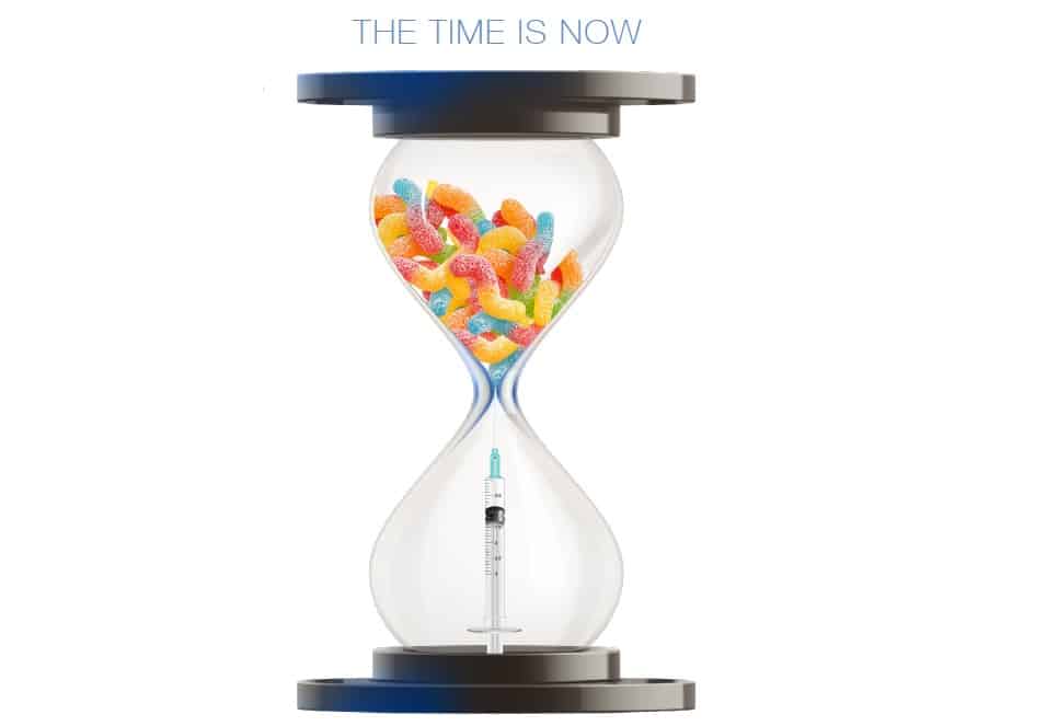 Hourglass with sweet treats inside. A metaphor for Type 2 Diabetes